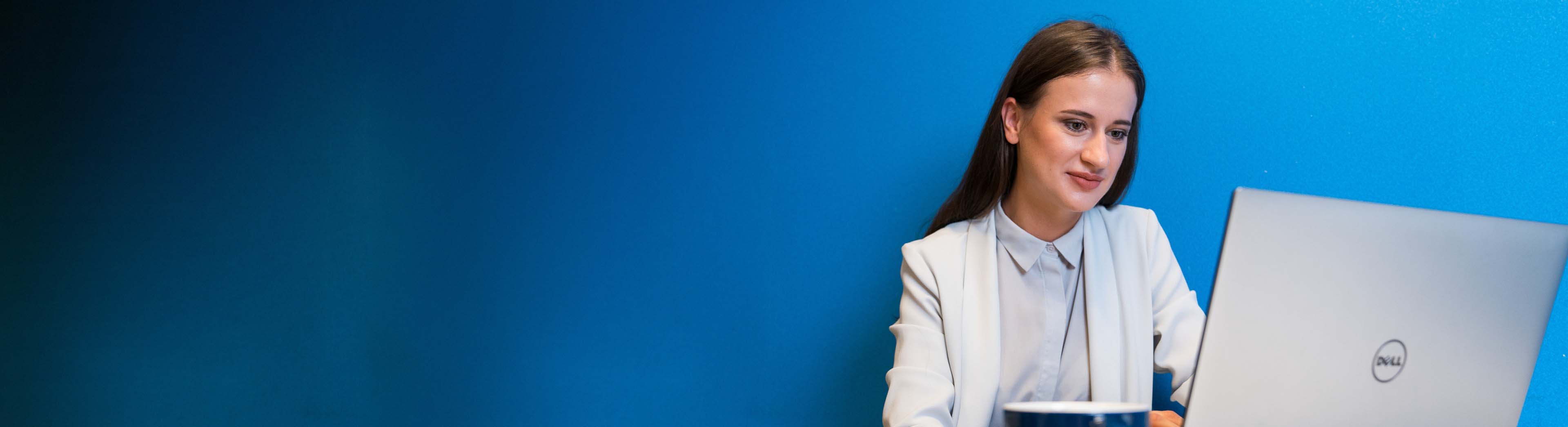 Female employee working on her laptop